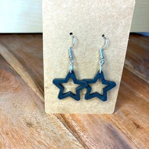 Black star dangling earrings